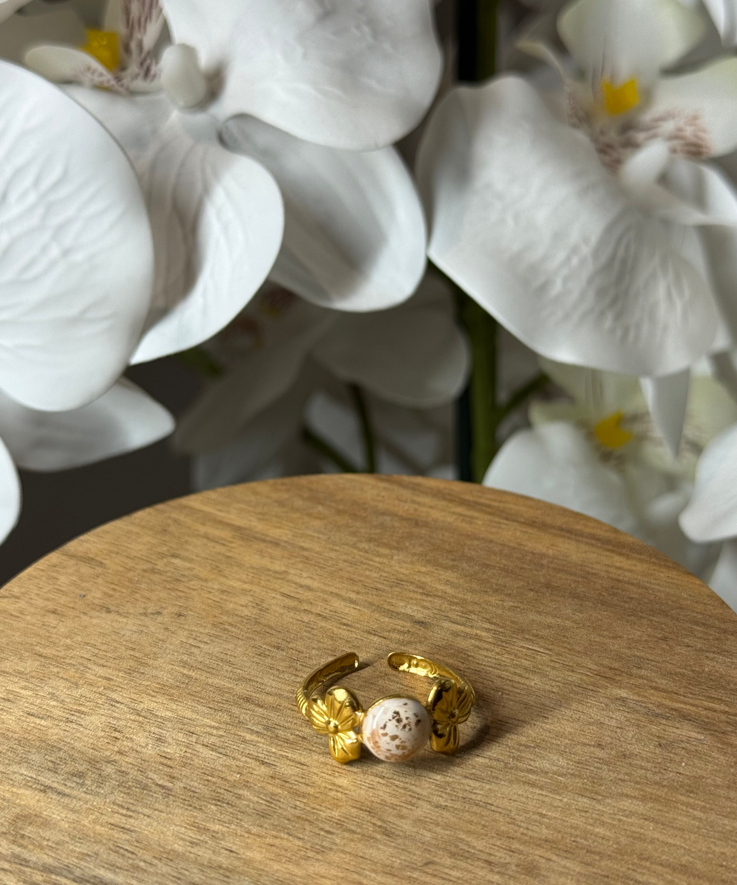 Bague dorée motif fleur