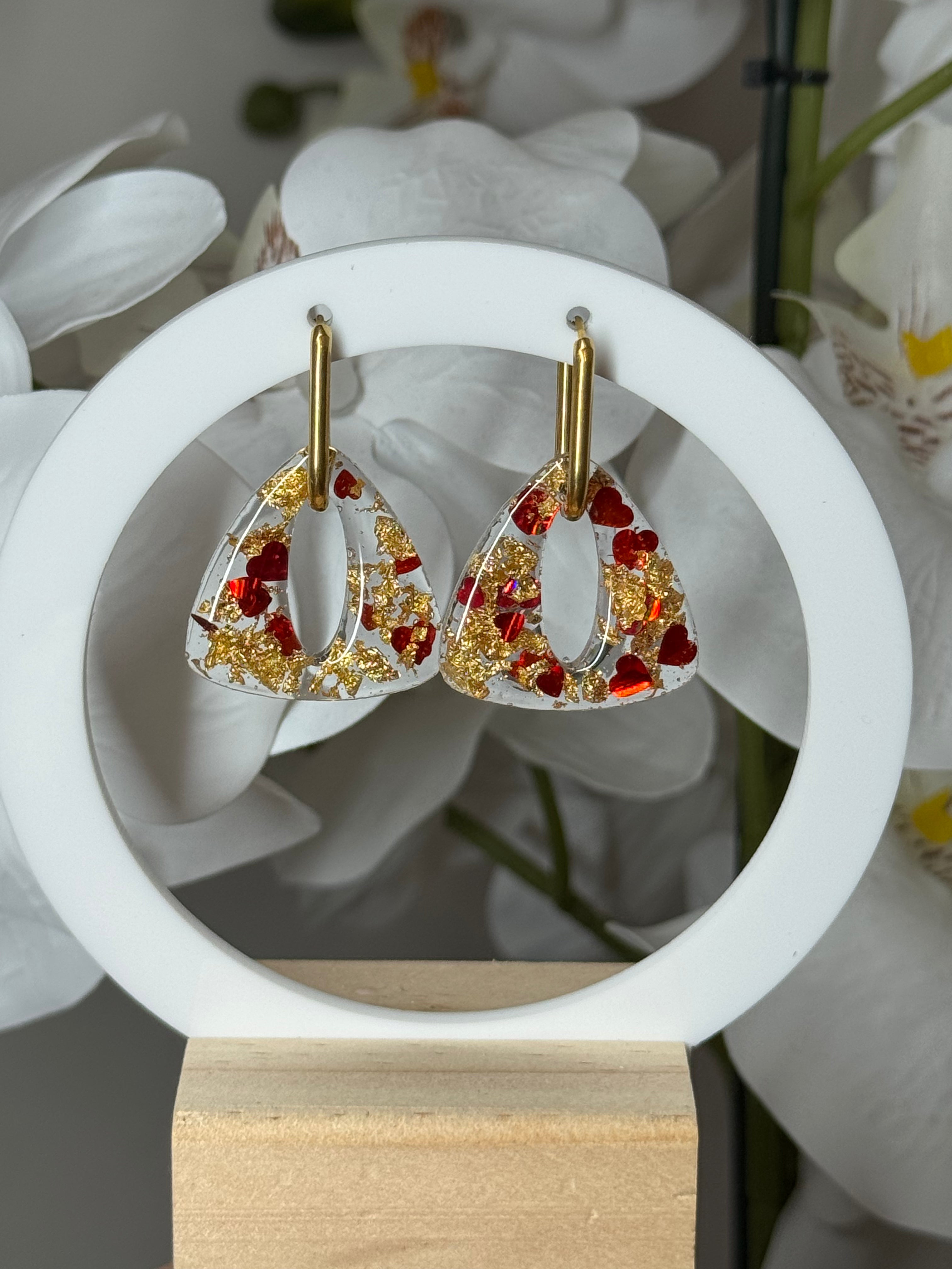 Aria dorée et coeur rouge